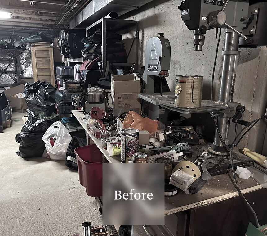 Liminal Before Basement Storage 3 A cluttered workbench with tools, cans, boxes, and various items in a basement or garage setting.
