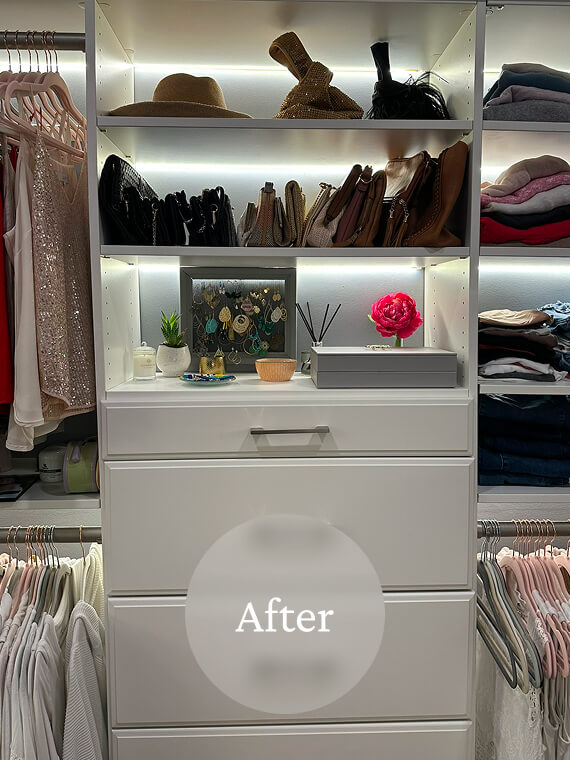 Liminal After Moms Closet Reorg 5 A neatly organized closet with hats, handbags, folded clothes, decorative items, and a drawer unit, illuminated by soft
